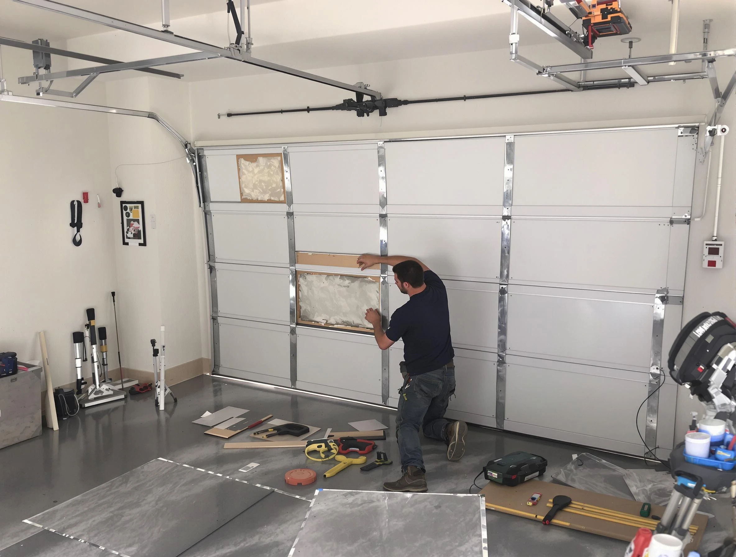 Garage Door Panel Repair in Lawrence